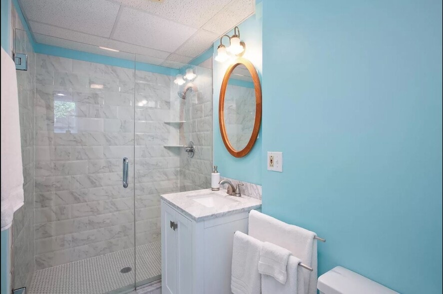 Cheery bathroom with updated shower - 1317 Summit Ave