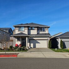 Building Photo - Spacious 4 Bedroom Home with Gas Fireplace, Office Space & 2-Car Garage!