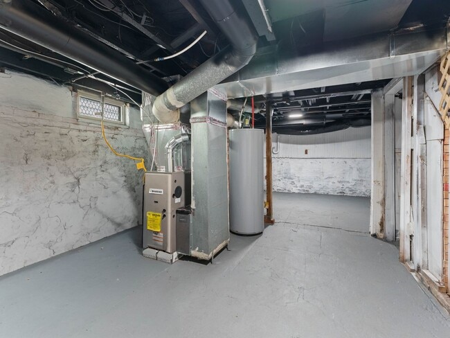 Building Photo - Beautifully Renovated 4-Bedroom Home with Designer Kitchen, Updated Bath & Central Air – Availabl...