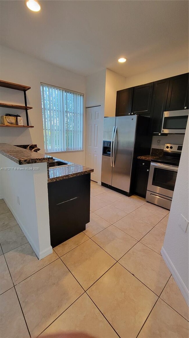 Building Photo - 12600 SW 50th Ct