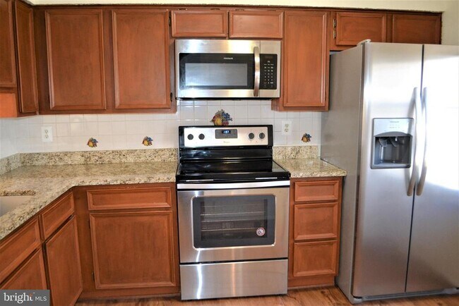 Building Photo - 8349 Windfall Rd