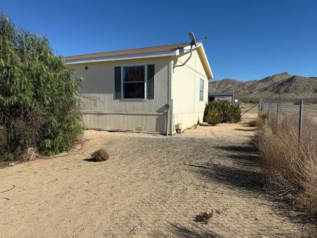 Building Photo - New Year Special! 50% Off First Month's Rent!