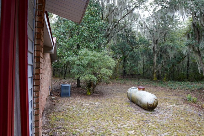 Building Photo - Tucked Away Three Bedroom Home