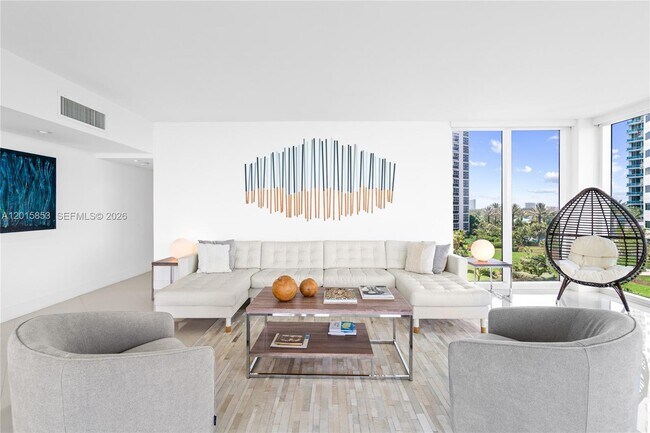 Building Photo - 10275 Collins Ave