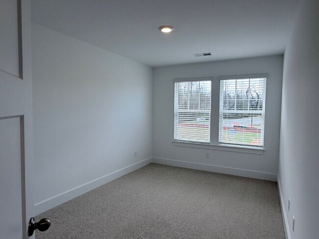 Building Photo - Brand-New 3BR Townhome with Garage in Clayton Crossing