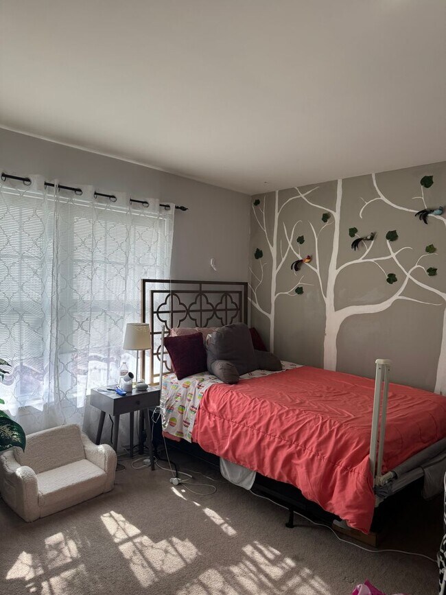 Building Photo - Stunning 3–4 Bedroom Townhome in Private Community | Garage + EV Charger | Deck with Tree Views