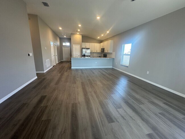 Building Photo - AVAILABLE MID APRIL- 4 Bedroom 2 bathroom 3 Car Garage NE Cape Coral Home with Screened Lania