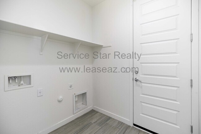 Building Photo - 9129 W Sells Dr