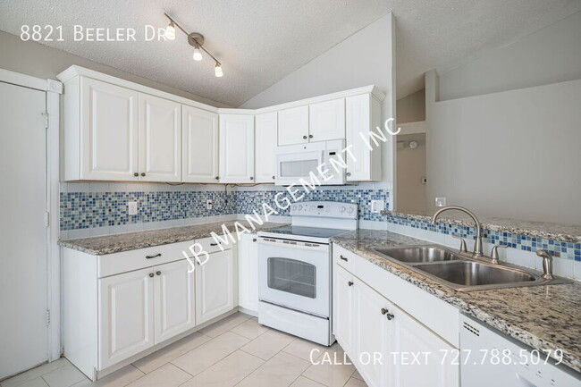 Building Photo - 8821 Beeler Dr