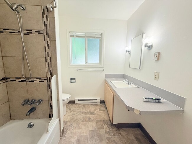 Building Photo - Update 2 Bedroom with Fenced Yard and Water/ Swear & Garbage Paid!