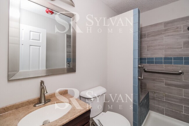 Building Photo - The living is easy in this 3 bedroom, 2.5 bathroom home