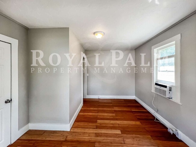 Building Photo - Deck the halls or the French doors, because this charming century-old single family home is avail...