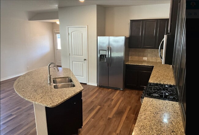 Building Photo - "Charming 4-Bedroom Home with Granite Elegance in San Antonio!"