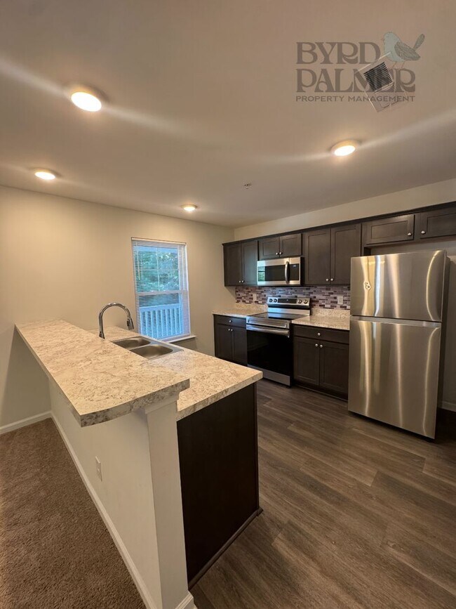 Building Photo - TURNING STONE