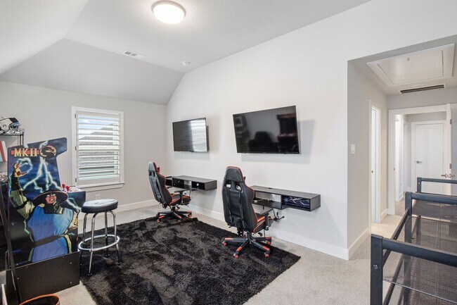 Building Photo - Stunning 4-Bedroom Luxury Residence with Bonus Office in the Prestigious Walsh Community LIKE NEW!