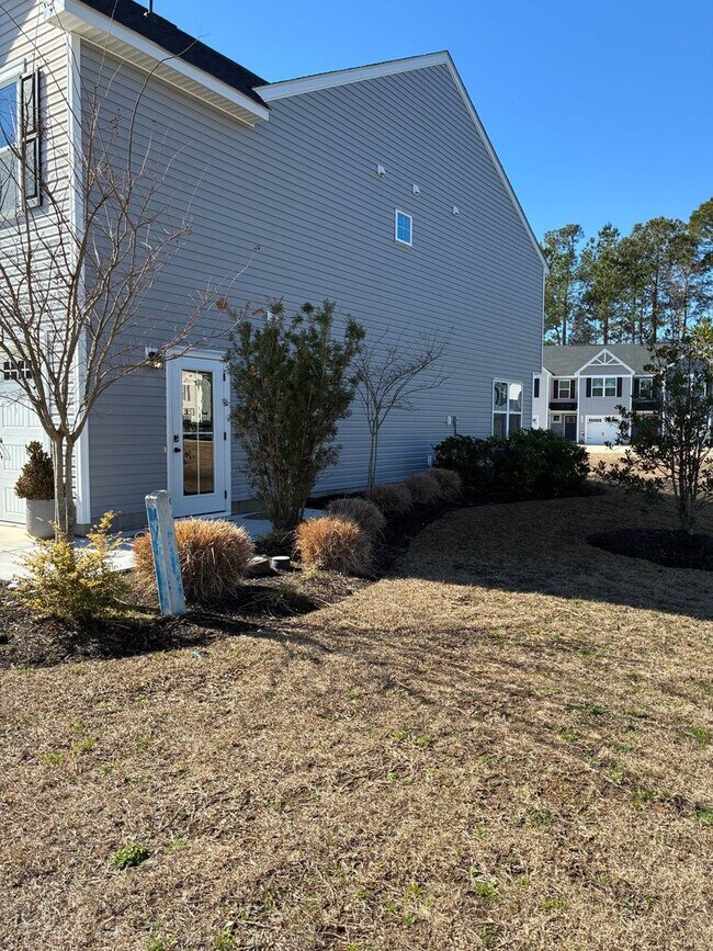 Building Photo - FORMER MODEL townhome at Villa Grande community