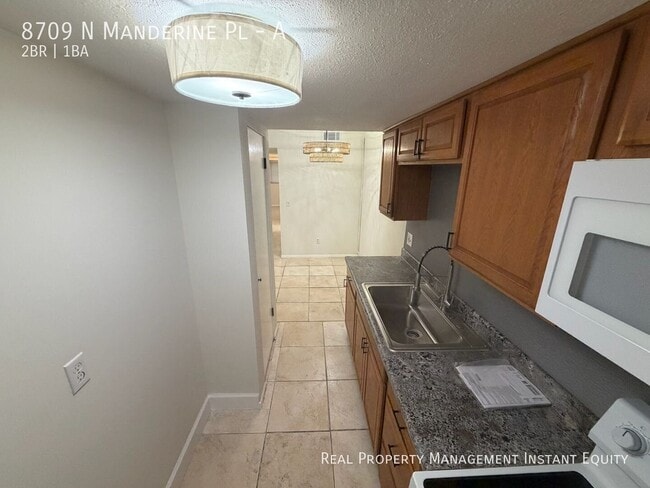 Building Photo - 8709 N Mandarine Pl