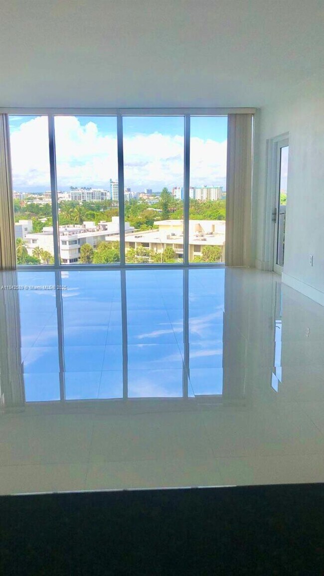 Building Photo - 10275 Collins Ave