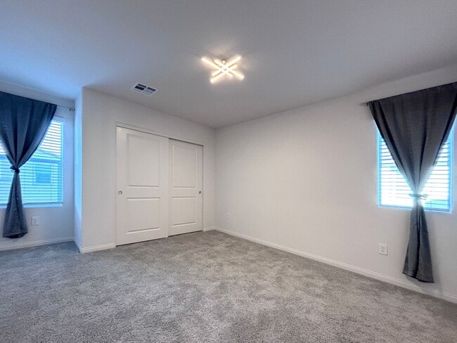 Building Photo - Modern 2024 Townhome in Gated Community with Resort-Style Amenities