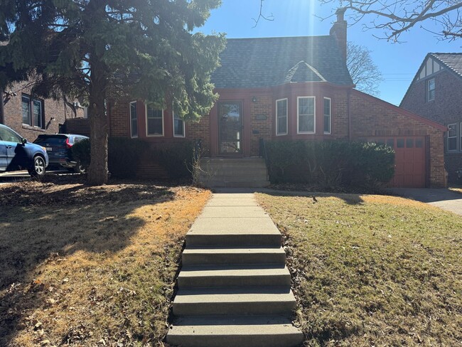 Building Photo - Charming Brick Ranch with Finished Basement & Fenced Yard