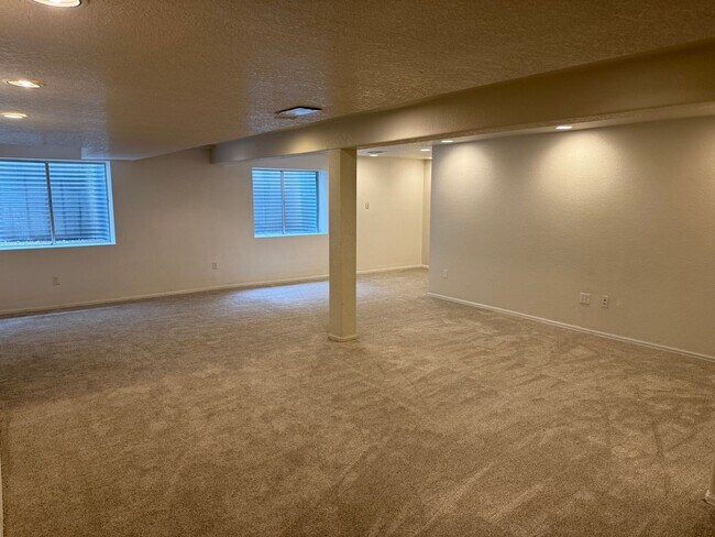 Building Photo - Spacious 4-Bedroom Ranch with Finished Bas...