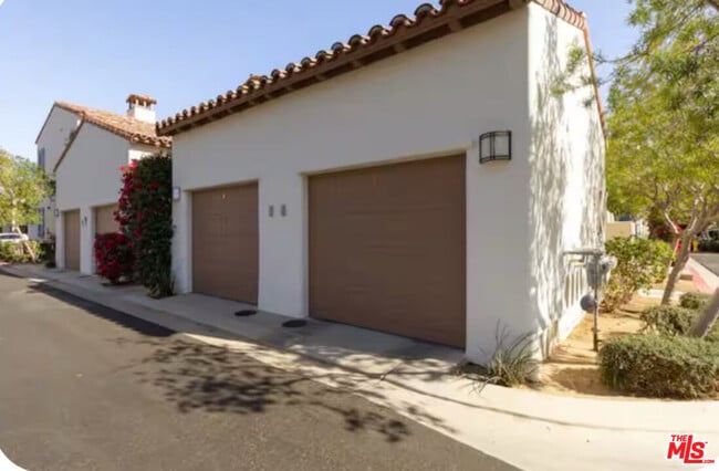 Building Photo - 77709 Tradition Dr