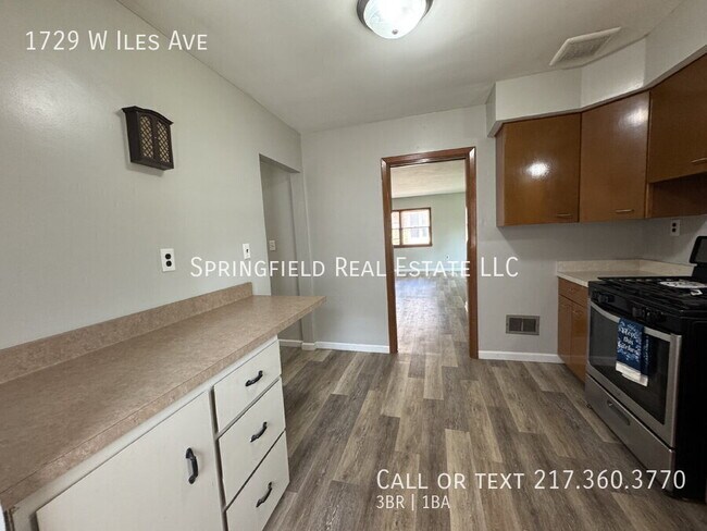 Building Photo - 1729 W Iles Ave