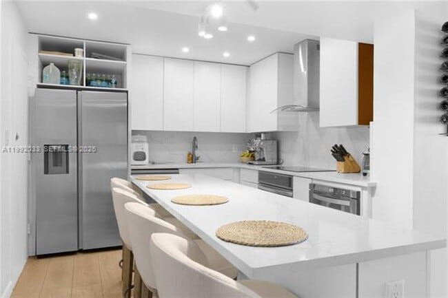 Building Photo - 5161 Collins Ave