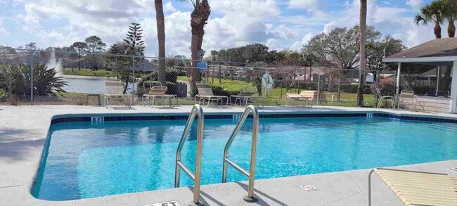 Building Photo - SPACIOUS, FIRST FLOOR CONDO WITH BIG FENCED IN PATIO IN THE LOVELY COMMUNITY OF QUAIL RIDGE!