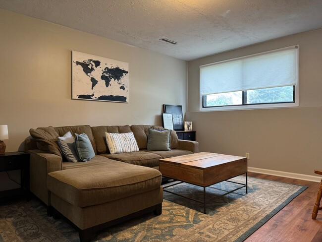 Building Photo - Spacious Corner Townhome with Private Yard...