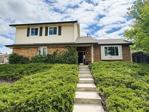 Building Photo - 4BR/4BA Updated Home with Finished Basement Suite & Landscaped Yard