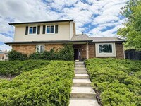 Building Photo - 4BR/4BA Updated Home with Finished Basement Suite & Landscaped Yard