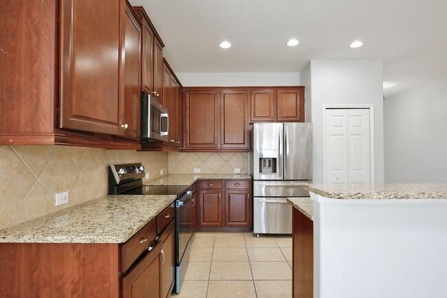 Building Photo - Stylish, Updated 3/2 Home in One of Millennia Park’s Gated Communities! Available Now!