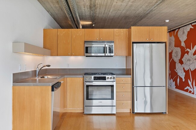 Building Photo - The Civic Condominiums - 8th floor west facing studio w/parking/ most utilities/concierge/views (...