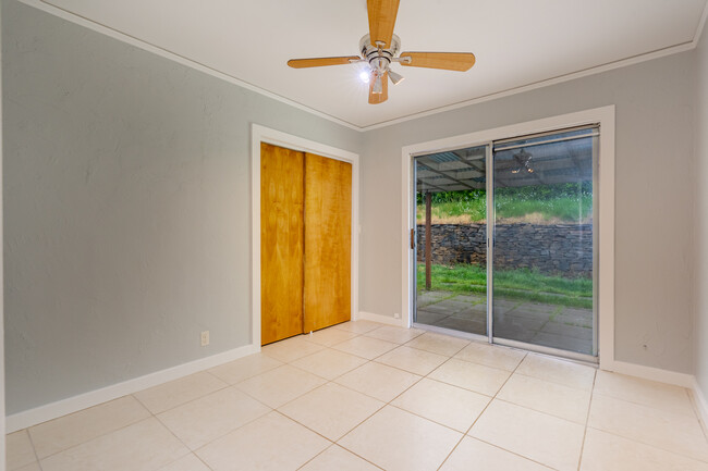 Bedroom #2 features a large closet and sliding doors to the backyard - 211 Farview Drive