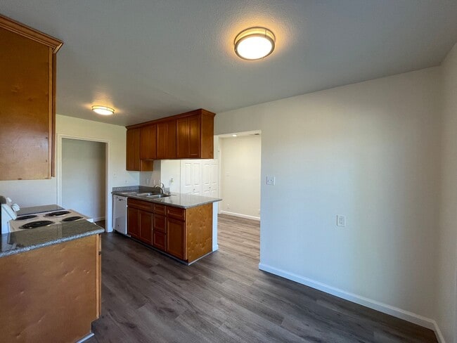 Building Photo - Centrally Located, Nicely Updated Throughout, Large Backyard, Attached Garage