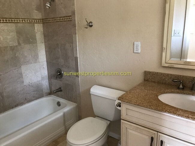 Building Photo - 3 Bedroom, 2 Bath, Fireplace and Fenced Ba...