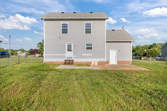 Building Photo - Charming Brick Home with Soaring Ceilings & Updated Finishes!