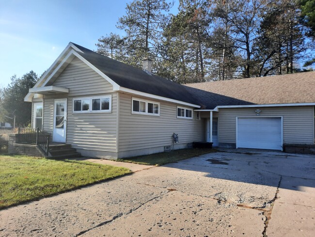 1 car garage with large attic storage space - 6979 US Highway 2 41 M35