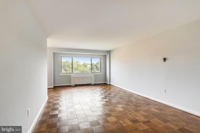 Building Photo - Welcome to The Towers!! This gem of a studio is nestled in a quiet neighborhood in Wesley Heights.