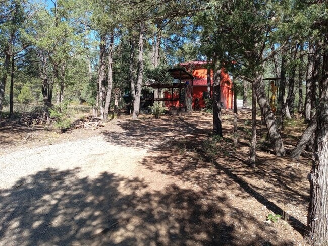 Building Photo - COZY HOME IN THE BEAUTIFUL TOWN OF TIJERAS | Showings available NOW!!