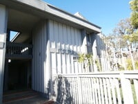 Building Photo - Upstairs Studio Condo in Huntington Harbor...