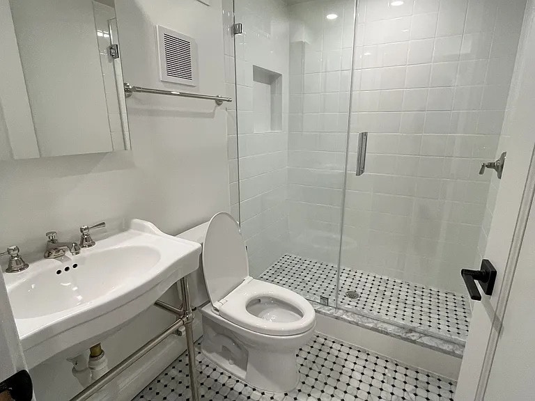 Subway wall tile, mosaic marble floor tile, and classic console sink. - 1755 Lamont St NW