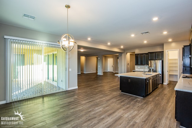 Building Photo - Welcome to this impressive single-story 4Bdm 3.5Ba residence located in a desirable Northwest Las...