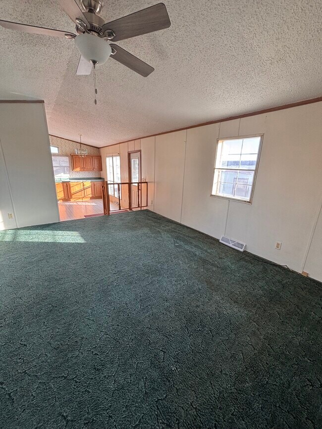 From living room into kitchen - 10543 Emberwood Dr