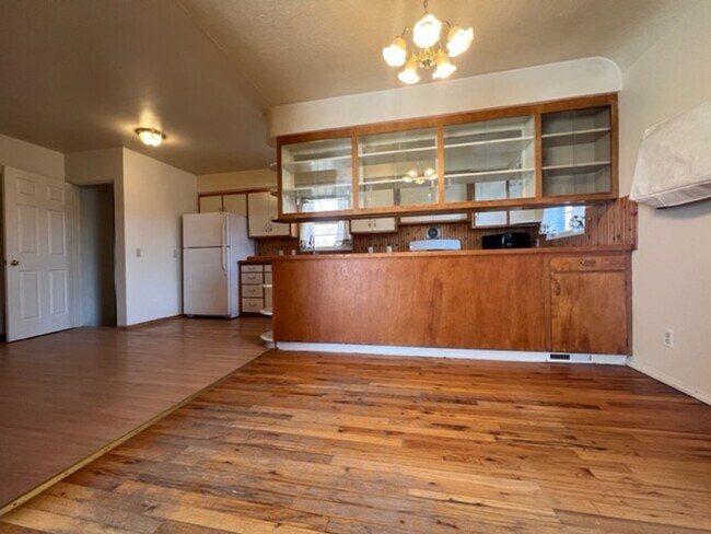 Building Photo - Bi-Level House w/ Massive Backyard, Storage, & Character!