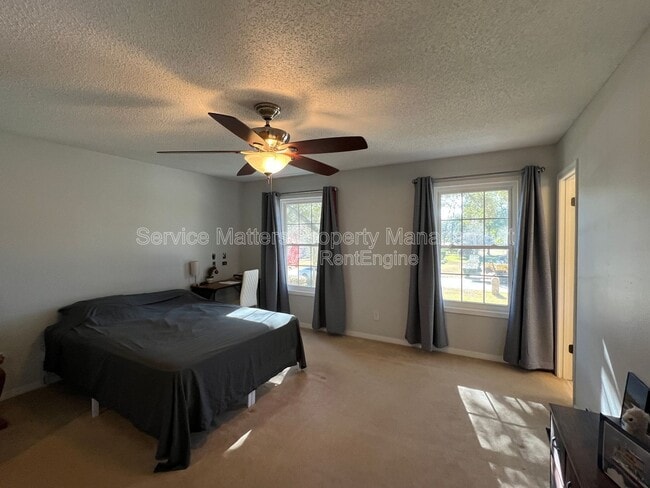 Building Photo - 6004 Players Pl