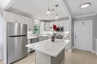 Building Photo - (55+) 2/2 Fully Renovated Furnished Condo ...