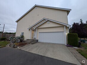 Building Photo - A Gardeners Oasis! 3 Bedroom Townhome for ...