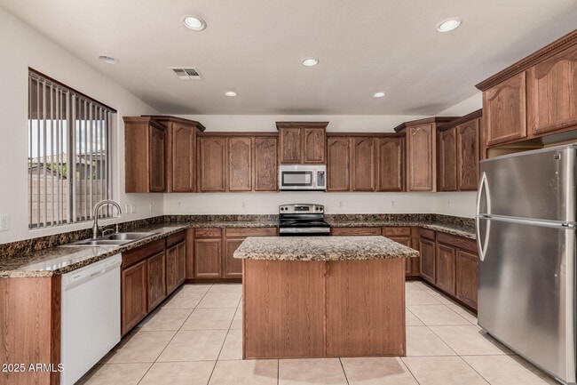 Building Photo - 7352 W Valencia Dr